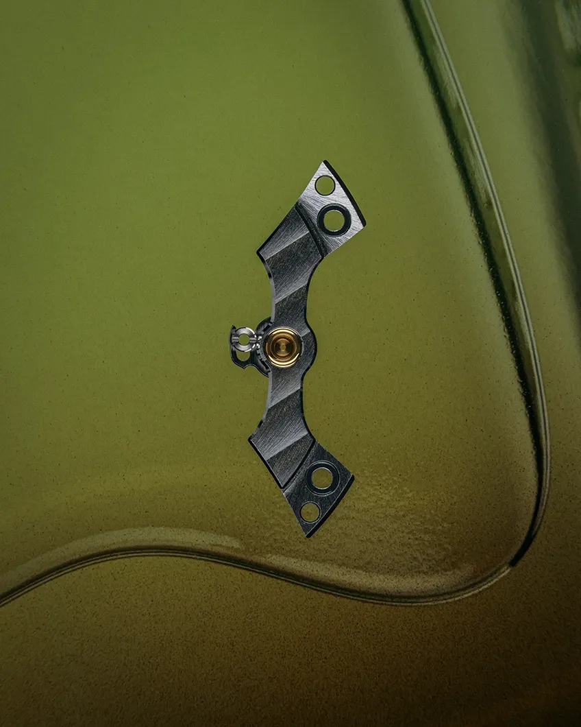 A visual capturing the Balance Bridge, a part of the Grand Seiko 9S Mechanical movement, like a piece of art.