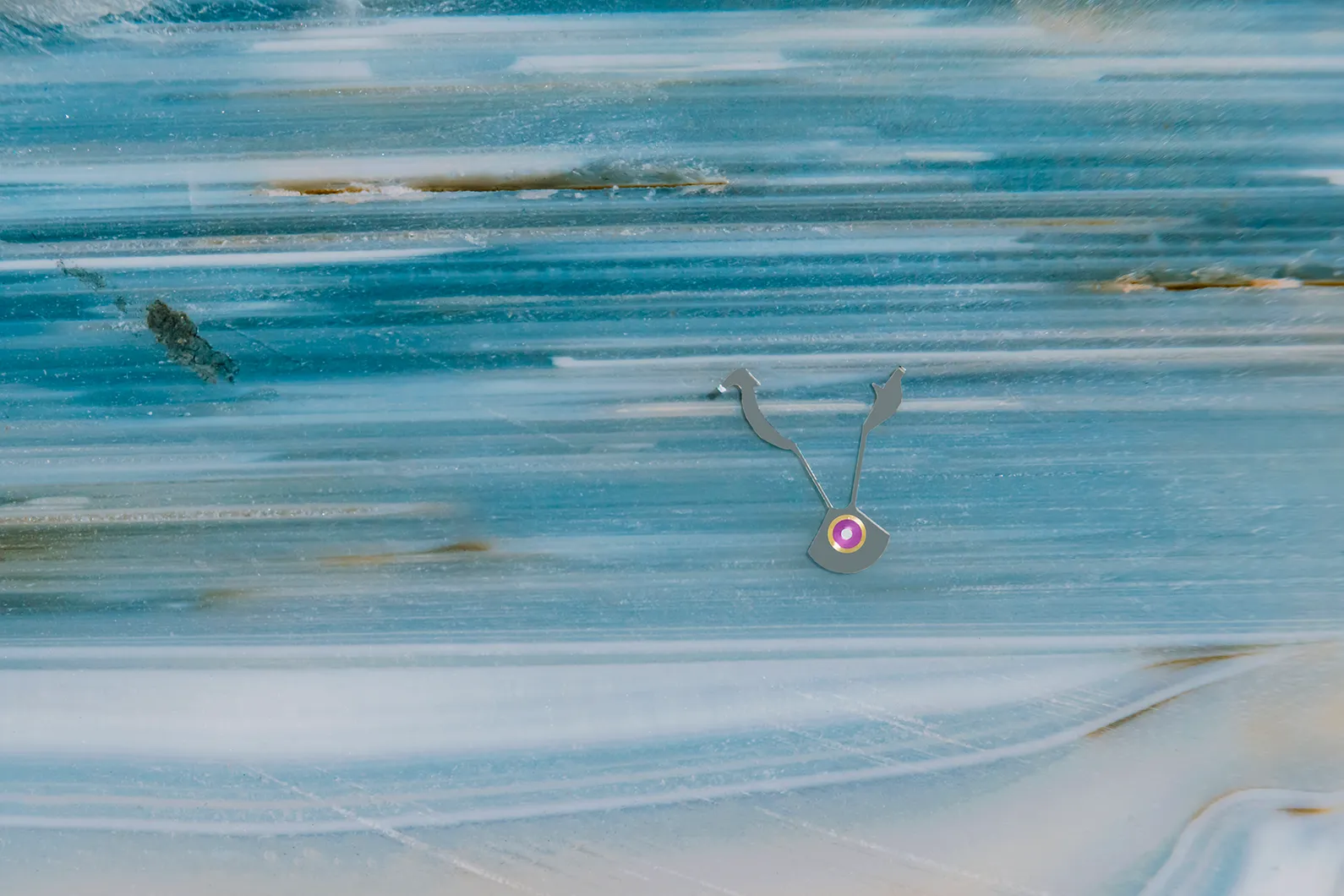 A visual capturing the Magic Lever, a part of Grand Seiko's 9R Spring Drive movement, like a piece of art.