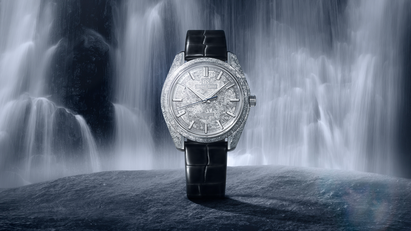 Exquisite hand engraving channels flowing water in a Spring Drive